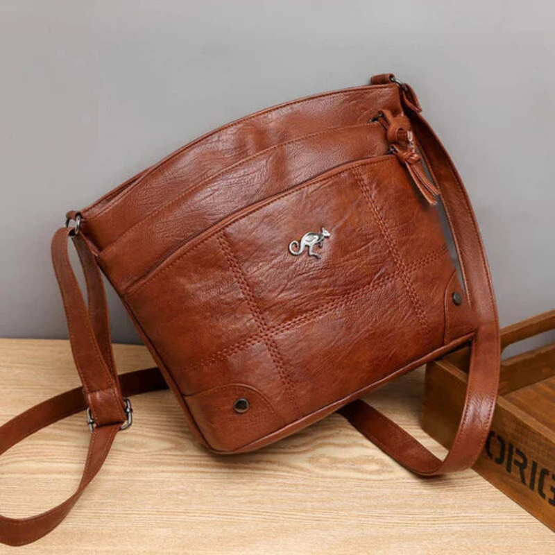 Leather Kangaroo Pin Crossbody Bag