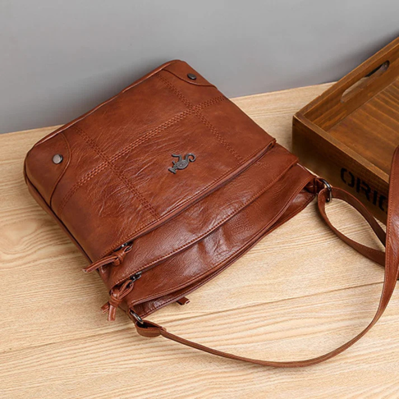 Leather Kangaroo Pin Crossbody Bag